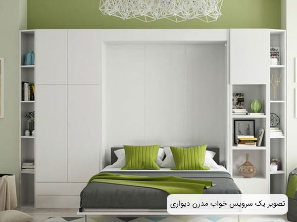 تصويری از يک تخت خواب تاشو با طراحی مدرن با بدنه ای به رنگ سفيد و خوشخواب به رنگ طوسی و سبز روشن .