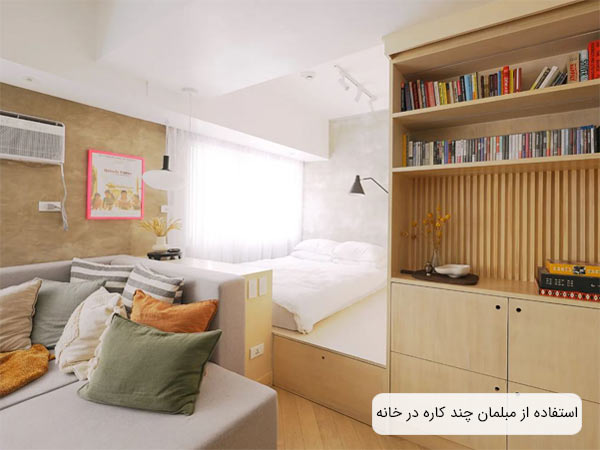 يک اتاق نشيمن کوچک با تختخواب هاي باکس دار و قفسه هاي ديواري براي ايجاد فضاي بيشتر انبارش.